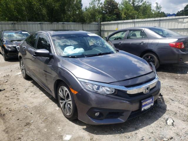 Photo 1 from auction – 2018 HONDA CIVIC EX with VIN JHMFC1F30JX043933