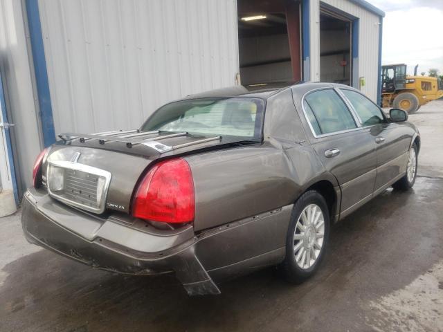 Photo 4 from auction – 2003 LINCOLN TOWN CAR E with VIN 1LNHM81W33Y697965