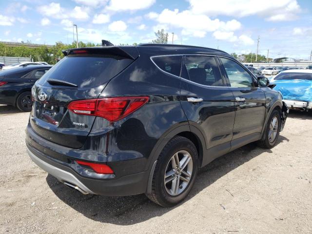 Photo 4 from auction – 2018 HYUNDAI SANTA FE S with VIN 5NMZU3LB2JH099951