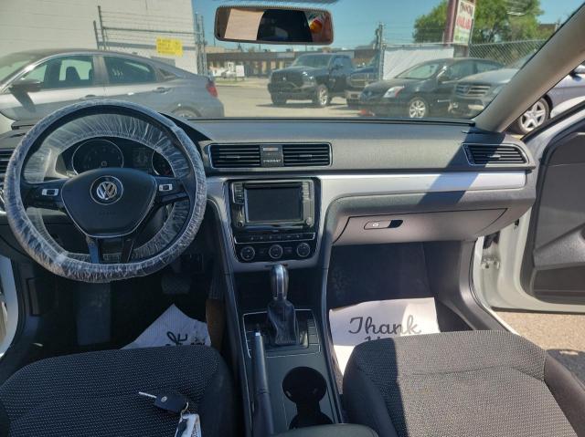 Photo 9 from auction – 2018 VOLKSWAGEN PASSAT S with VIN 1VWAA7A32JC036627