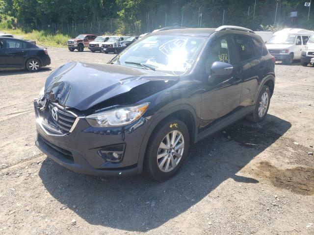Photo 2 from auction – 2016 MAZDA CX-5 with VIN JM3KE4CY2G0757308