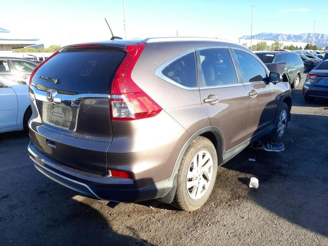 Photo 4 from auction – 2015 HONDA CR-V EXL with VIN 2HKRM3H73FH557138