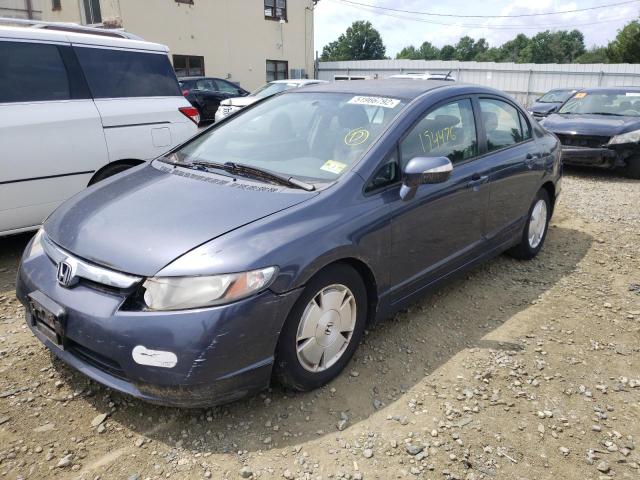 Photo 2 from auction – 2006 HONDA CIVIC HYBR with VIN JHMFA36246S020734