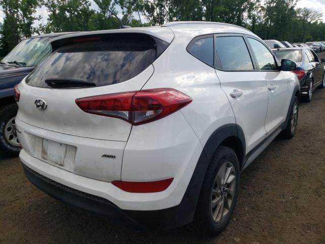 Photo 4 from auction – 2017 HYUNDAI TUCSON LIM with VIN KM8J3CA49HU456769