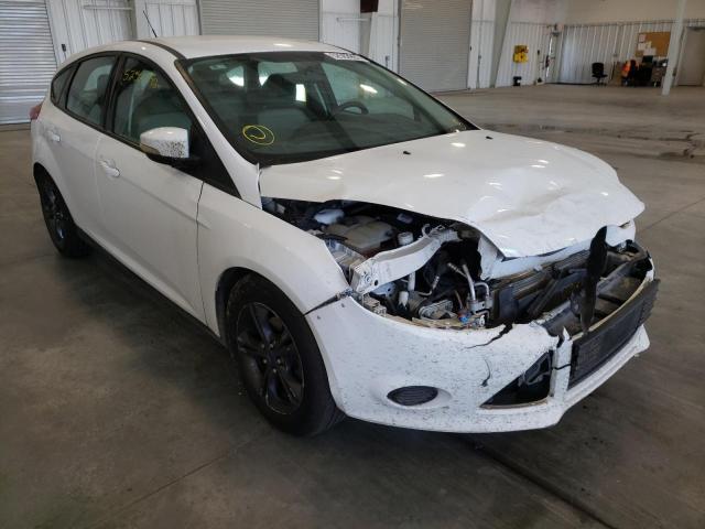FORD FOCUS SE 2014 with VIN 1FADP3K22EL230017 - Photo from auction