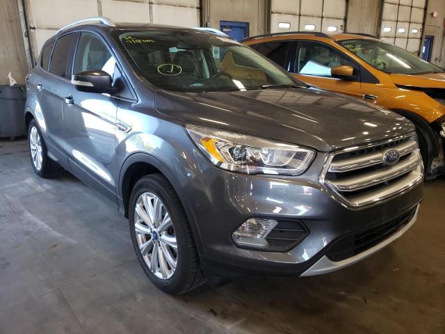 FORD ESCAPE TIT 2017 with VIN 1FMCU9JD8HUC63750 - Photo from auction