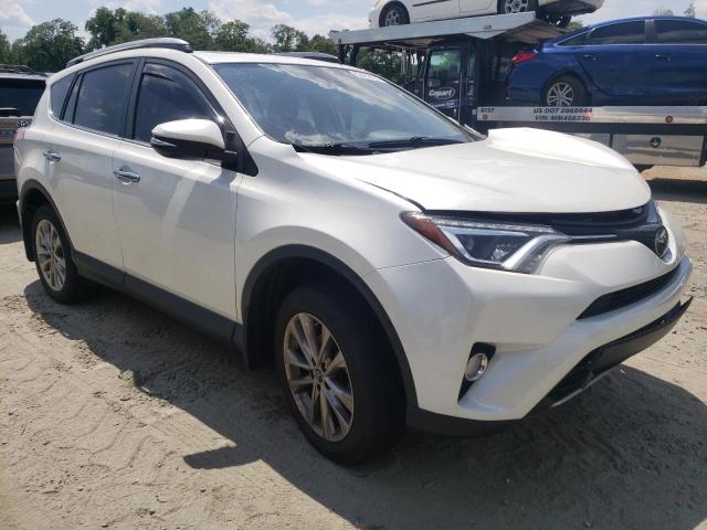 TOYOTA RAV4 LIMIT 2018 with VIN JTMDFREV6JD233254 - Photo from auction