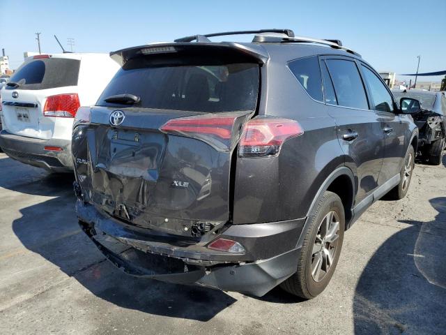 Photo 4 from auction – 2016 TOYOTA RAV4 XLE with VIN 2T3WFREV1GW237491