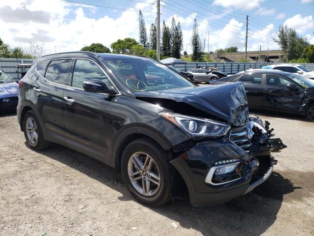 HYUNDAI SANTA FE S 2018 with VIN 5NMZU3LB2JH099951 - Photo from auction