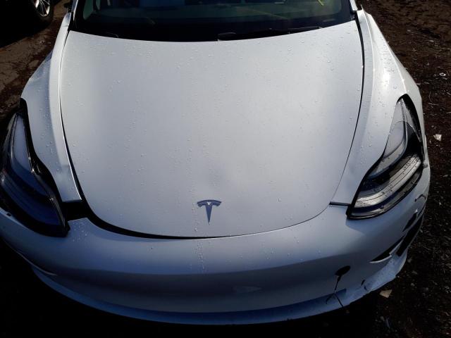 Photo 7 from auction – 2022 TESLA MODEL 3 with VIN 5YJ3E1EC8NF274028