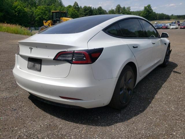 Photo 4 from auction – 2021 TESLA MODEL 3 with VIN 5YJ3E1EA9MF046701