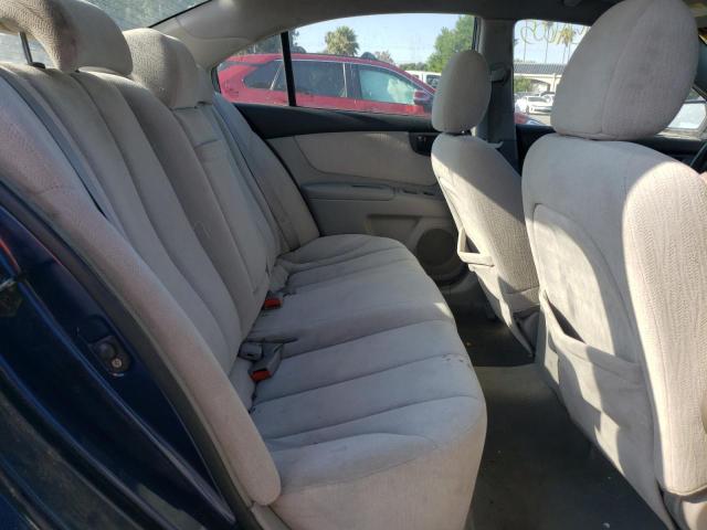 Photo 6 from auction – 2006 KIA OPTIMA LX with VIN KNAGE123465052754