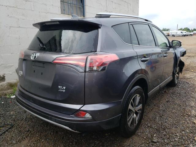 Photo 4 from auction – 2017 TOYOTA RAV4 XLE with VIN JTMRFREVXHJ115547