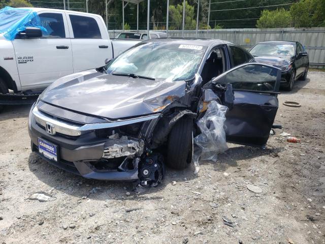 Photo 2 from auction – 2018 HONDA CIVIC EX with VIN JHMFC1F30JX043933