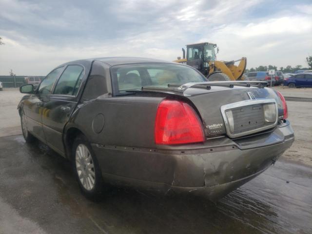 Photo 3 from auction – 2003 LINCOLN TOWN CAR E with VIN 1LNHM81W33Y697965