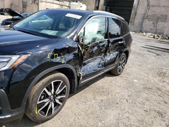 Photo 9 from auction – 2020 HONDA PILOT ELIT with VIN 5FNYF6H07LB055107