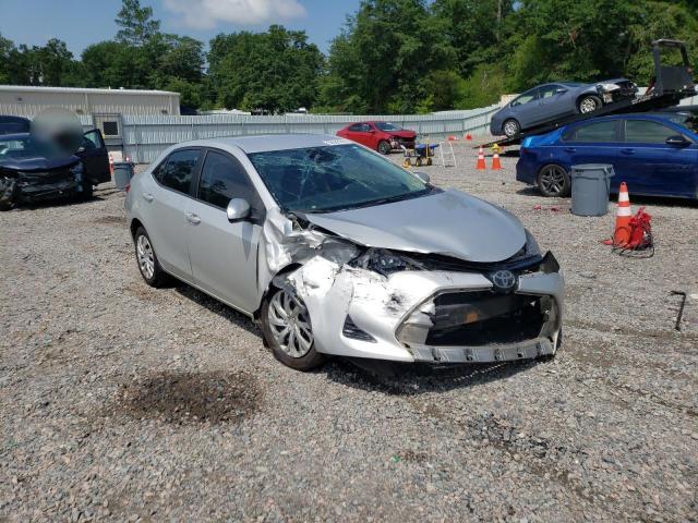 TOYOTA COROLLA L 2018 with VIN 5YFBURHE0JP853121 - Photo from auction