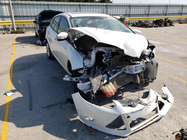 FORD FOCUS SE 2014 with VIN 1FADP3K23EL180213 - Photo from auction