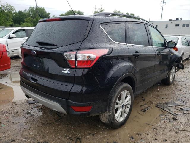 Photo 4 from auction – 2018 FORD ESCAPE SE with VIN 1FMCU9GD0JUC50035