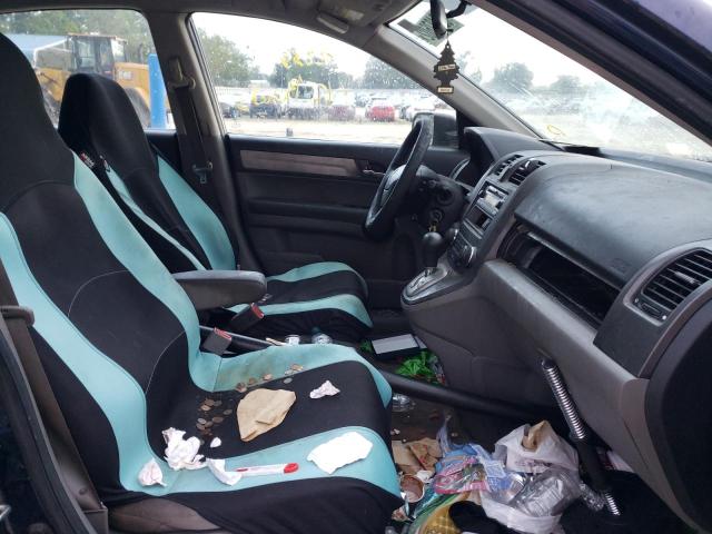 Photo 5 from auction – 2011 HONDA CR-V LX with VIN 5J6RE3H33BL036303