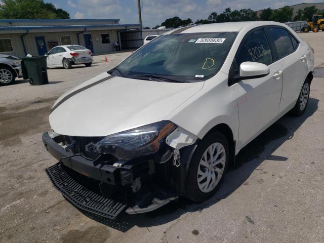 Photo 2 from auction – 2018 TOYOTA COROLLA L with VIN 5YFBURHE2JP853329