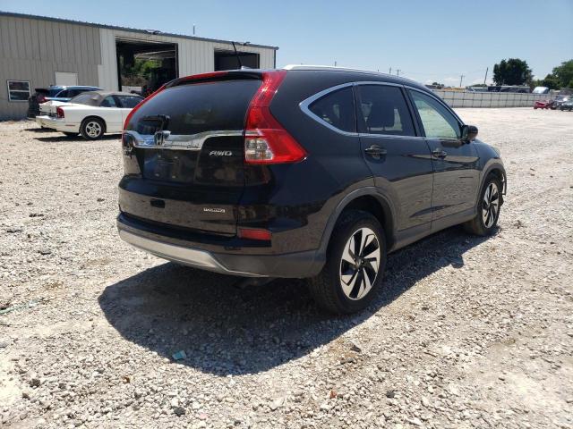 Photo 4 from auction – 2016 HONDA CR-V TOURI with VIN 5J6RM4H97GL081328