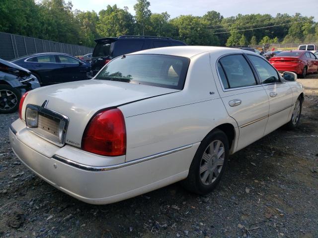 Photo 4 from auction – 2003 LINCOLN TOWNCAR with VIN 1LNHM83WX3Y601620