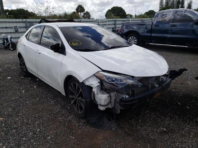 TOYOTA COROLLA L 2017 with VIN 5YFBURHE1HP674449 - Photo from auction