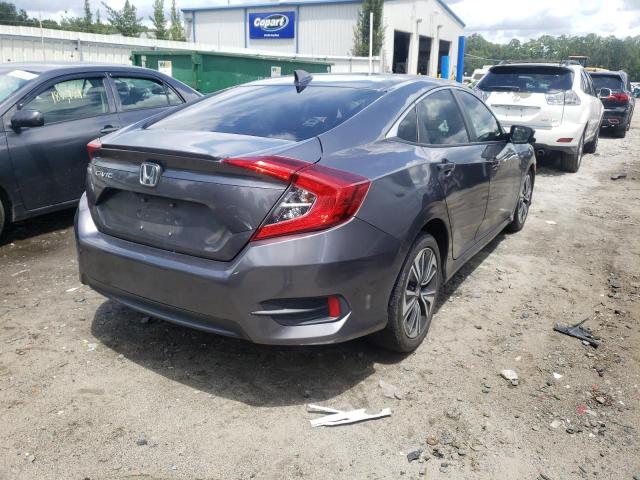 Photo 4 from auction – 2018 HONDA CIVIC EX with VIN JHMFC1F30JX043933