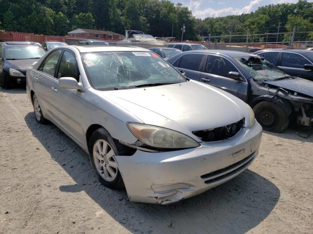 TOYOTA CAMRY LE 2002 with VIN 4T1BF30K32U507928 - Photo from auction