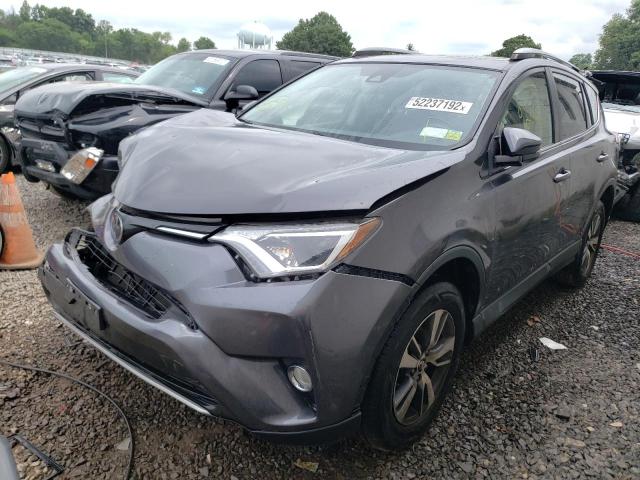 Photo 2 from auction – 2017 TOYOTA RAV4 XLE with VIN JTMRFREVXHJ115547