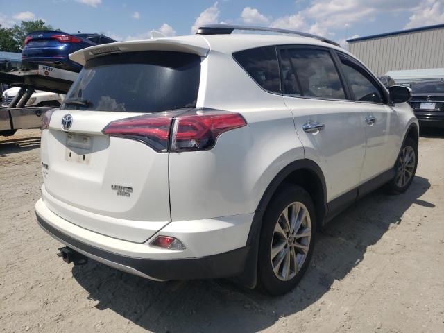 Photo 4 from auction – 2018 TOYOTA RAV4 LIMIT with VIN JTMDFREV6JD233254