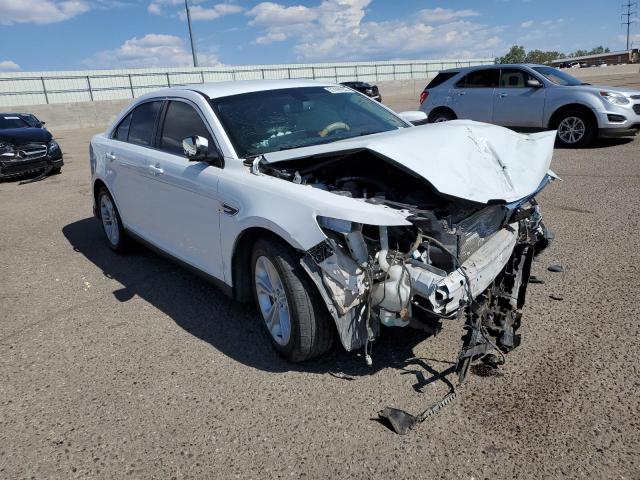 FORD TAURUS SEL 2015 with VIN 1FAHP2E81FG209309 - Photo from auction
