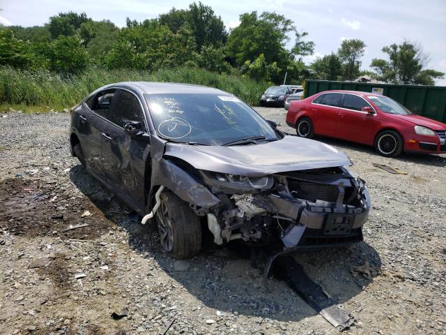 HONDA CIVIC EX 2018 with VIN 2HGFC2F75JH536765 - Photo from auction