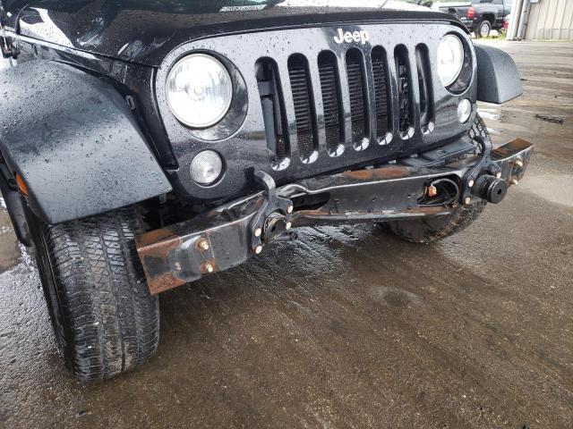 Photo 9 from auction – 2014 JEEP WRANGLER U with VIN 1C4BJWDG0EL208370