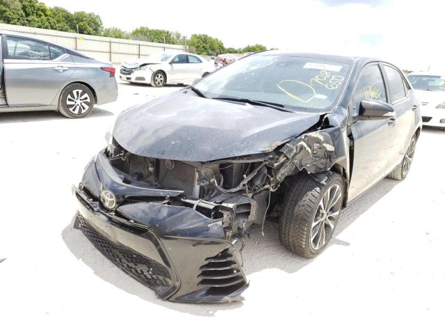 Photo 2 from auction – 2017 TOYOTA COROLLA L with VIN 5YFBURHE1HP708650