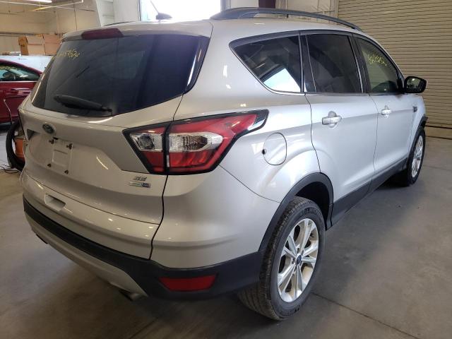 Photo 4 from auction – 2017 FORD ESCAPE SE with VIN 1FMCU9GD4HUB40907