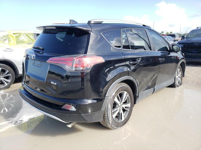 Photo 4 from auction – 2016 TOYOTA RAV4 XLE with VIN 2T3WFREV0GW264522