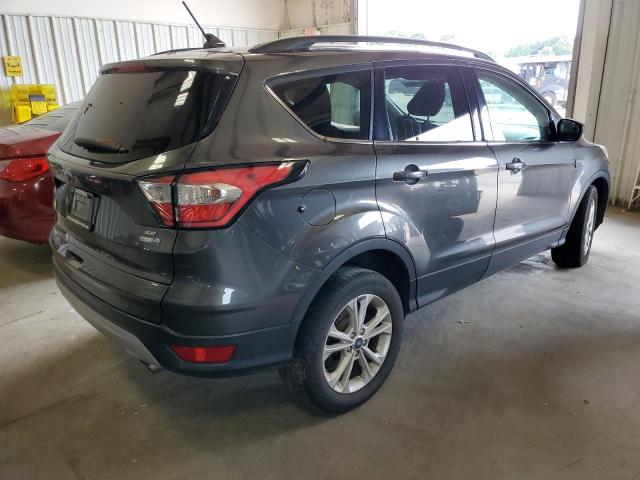 Photo 4 from auction – 2018 FORD ESCAPE SE with VIN 1FMCU9GDXJUB24782