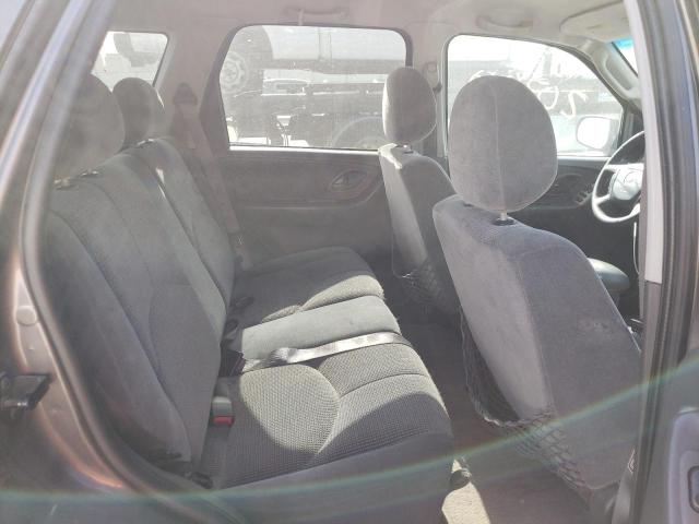 Photo 6 from auction – 2003 MAZDA TRIBUTE LX with VIN 4F2YZ04113KM06972