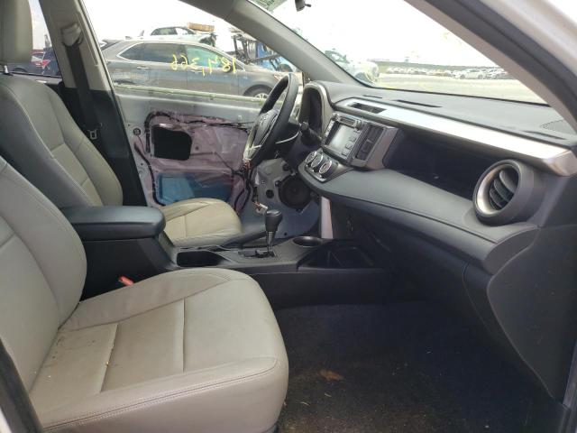 Photo 5 from auction – 2014 TOYOTA RAV4 LE with VIN JTMZFREV8EJ021579
