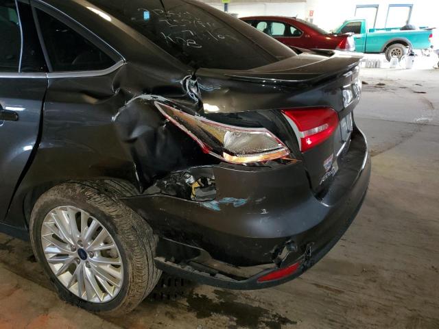 Photo 9 from auction – 2018 FORD FOCUS TITA with VIN 1FADP3J25JL294239