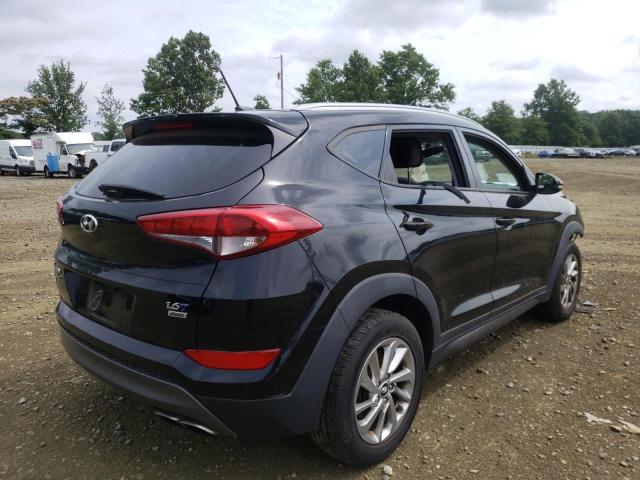 Photo 4 from auction – 2016 HYUNDAI TUCSON LIM with VIN KM8J3CA29GU144643