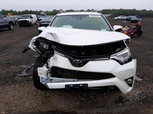 Photo 9 from auction – 2018 TOYOTA RAV4 LIMIT with VIN 2T3DFREV1JW736564