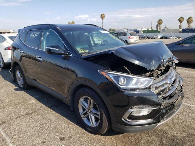HYUNDAI SANTA FE S 2018 with VIN 5NMZU3LB3JH057790 - Photo from auction