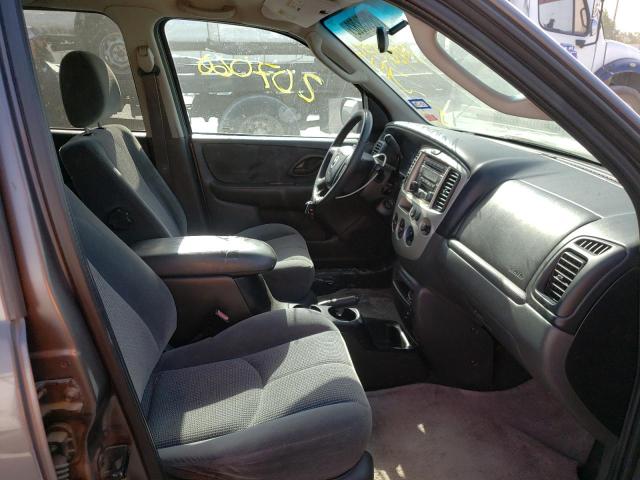 Photo 5 from auction – 2003 MAZDA TRIBUTE LX with VIN 4F2YZ04113KM06972