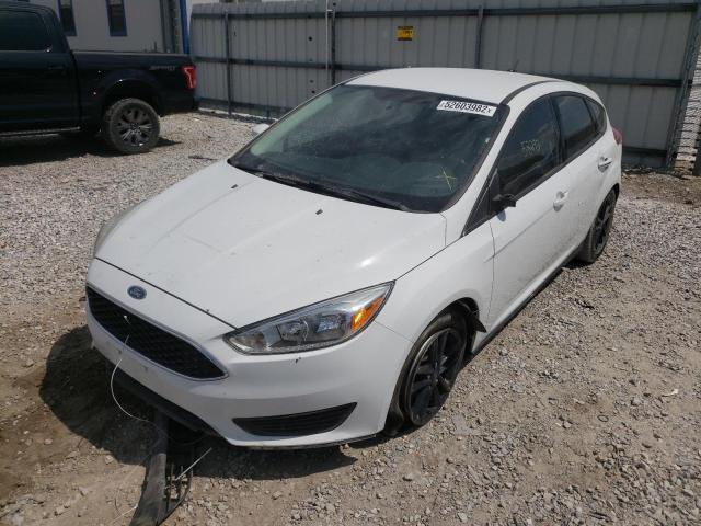 Photo 2 from auction – 2015 FORD FOCUS SE with VIN 1FADP3K27FL281028