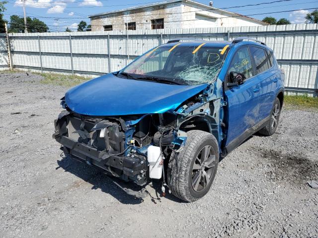 Photo 2 from auction – 2017 TOYOTA RAV4 XLE with VIN JTMRFREVXHD209975
