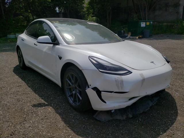 TESLA MODEL 3 2021 with VIN 5YJ3E1EA9MF046701 - Photo from auction