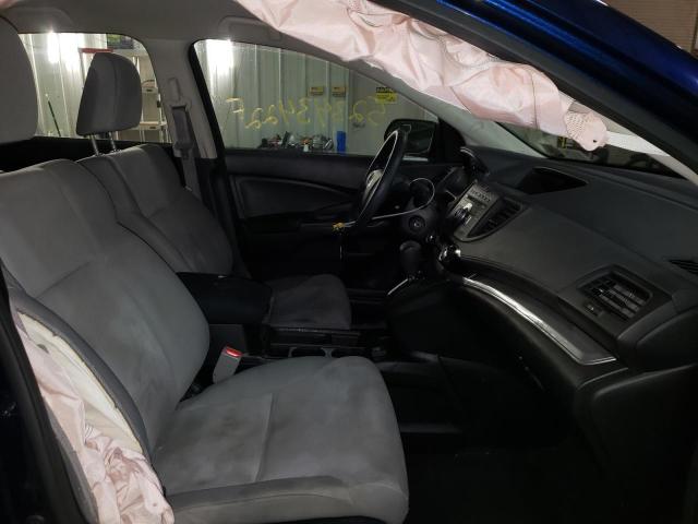 Photo 5 from auction – 2015 HONDA CR-V LX with VIN 5J6RM4H39FL076609